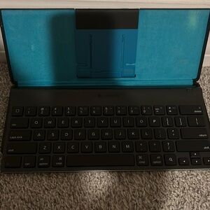 Logitech keyboard with case.